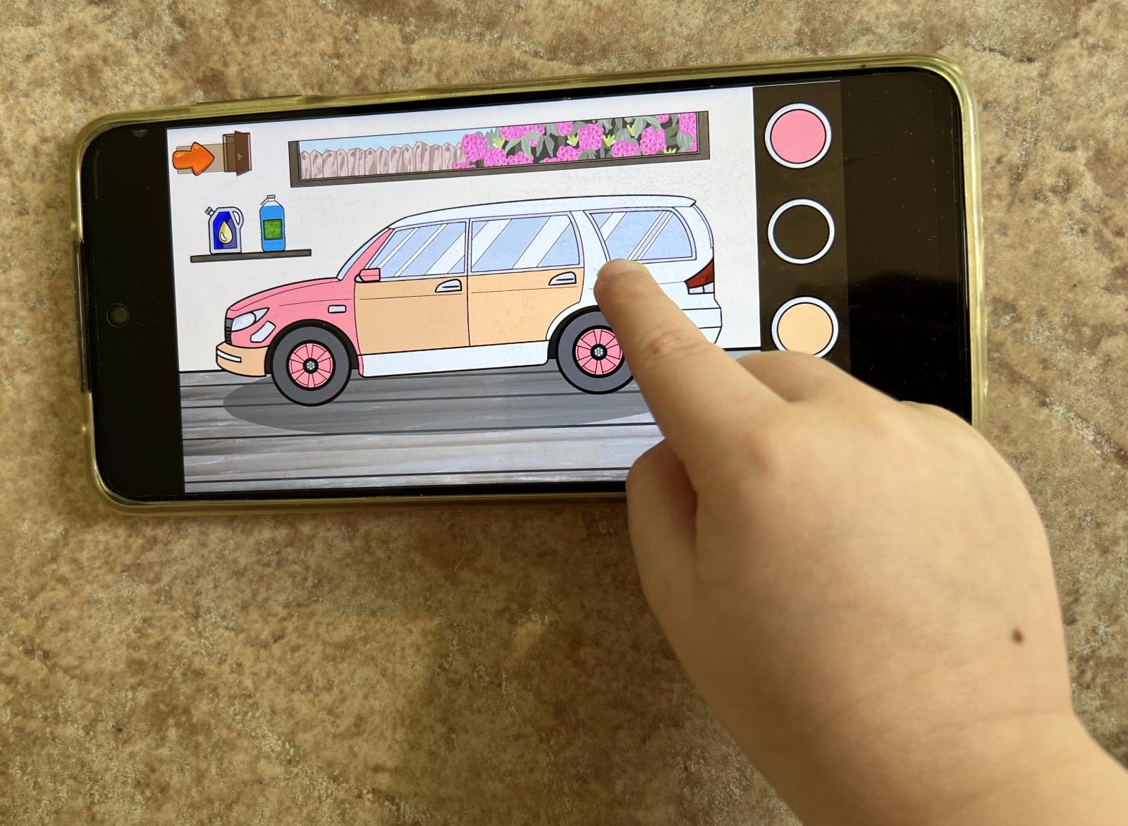 Child Plays with Phone Car Game